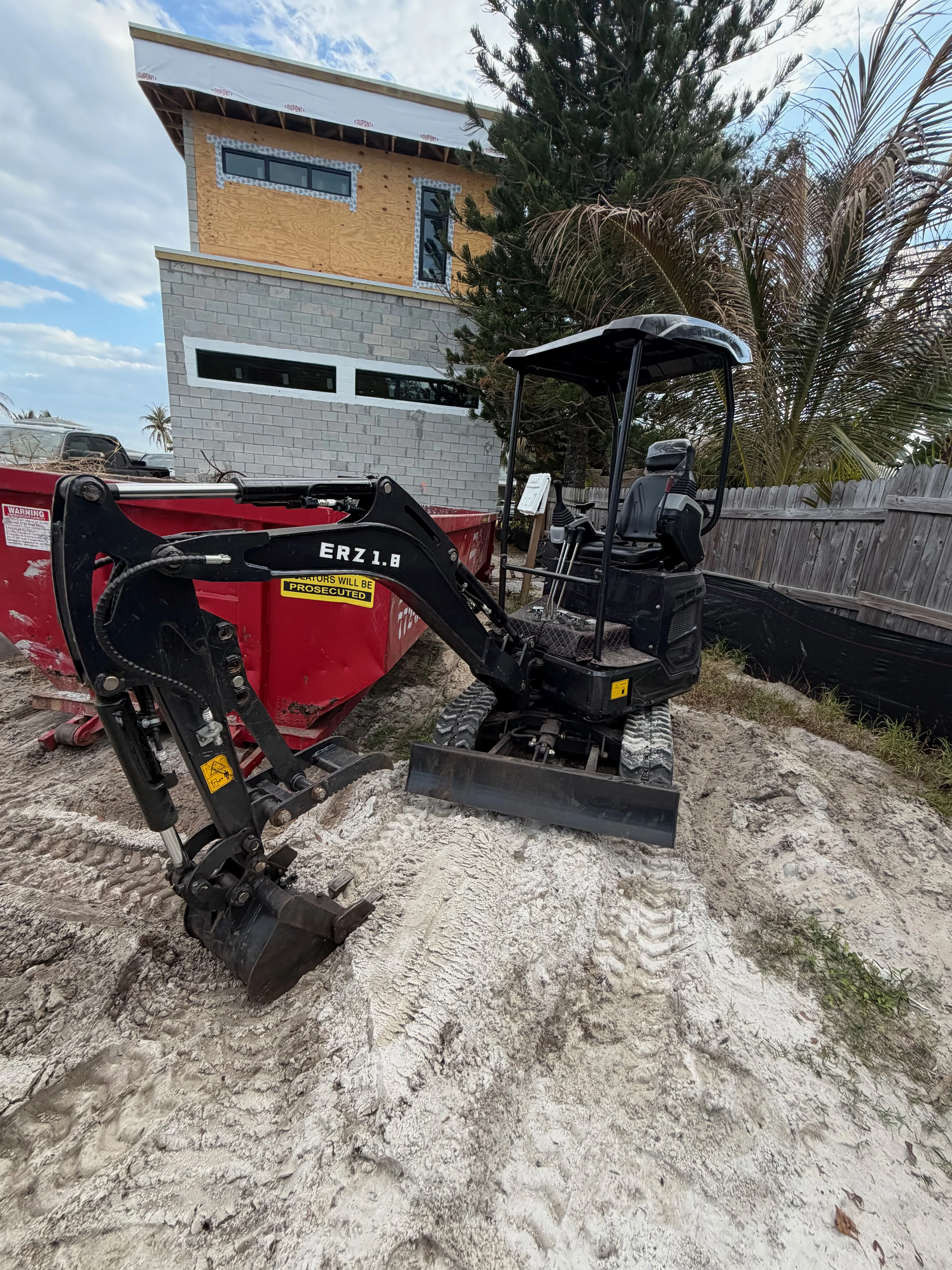 Mini excavator rental new construction site prep Stuart FL