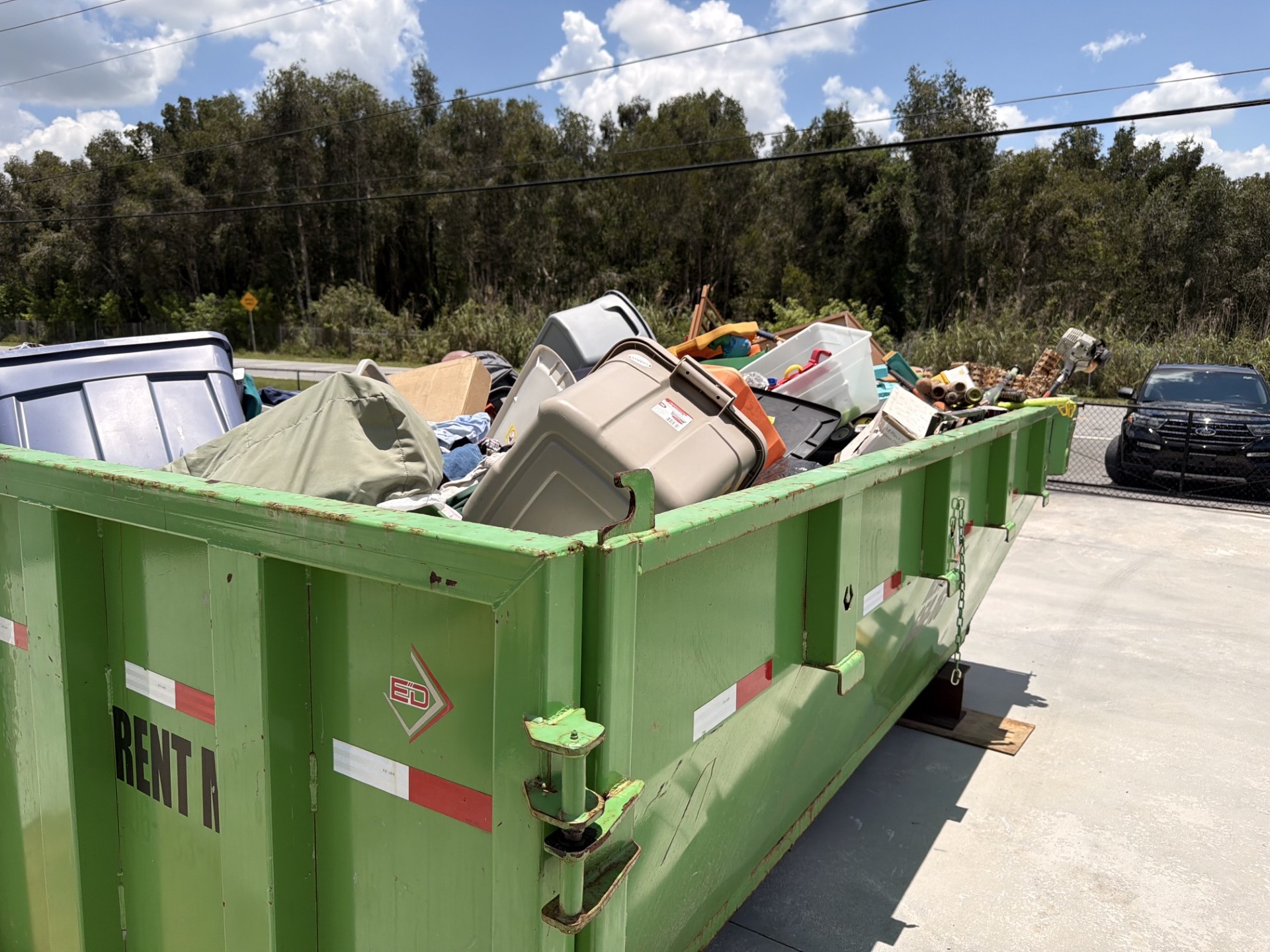 15 yard roll-off dumpster rental Palm City FL — home cleanout
