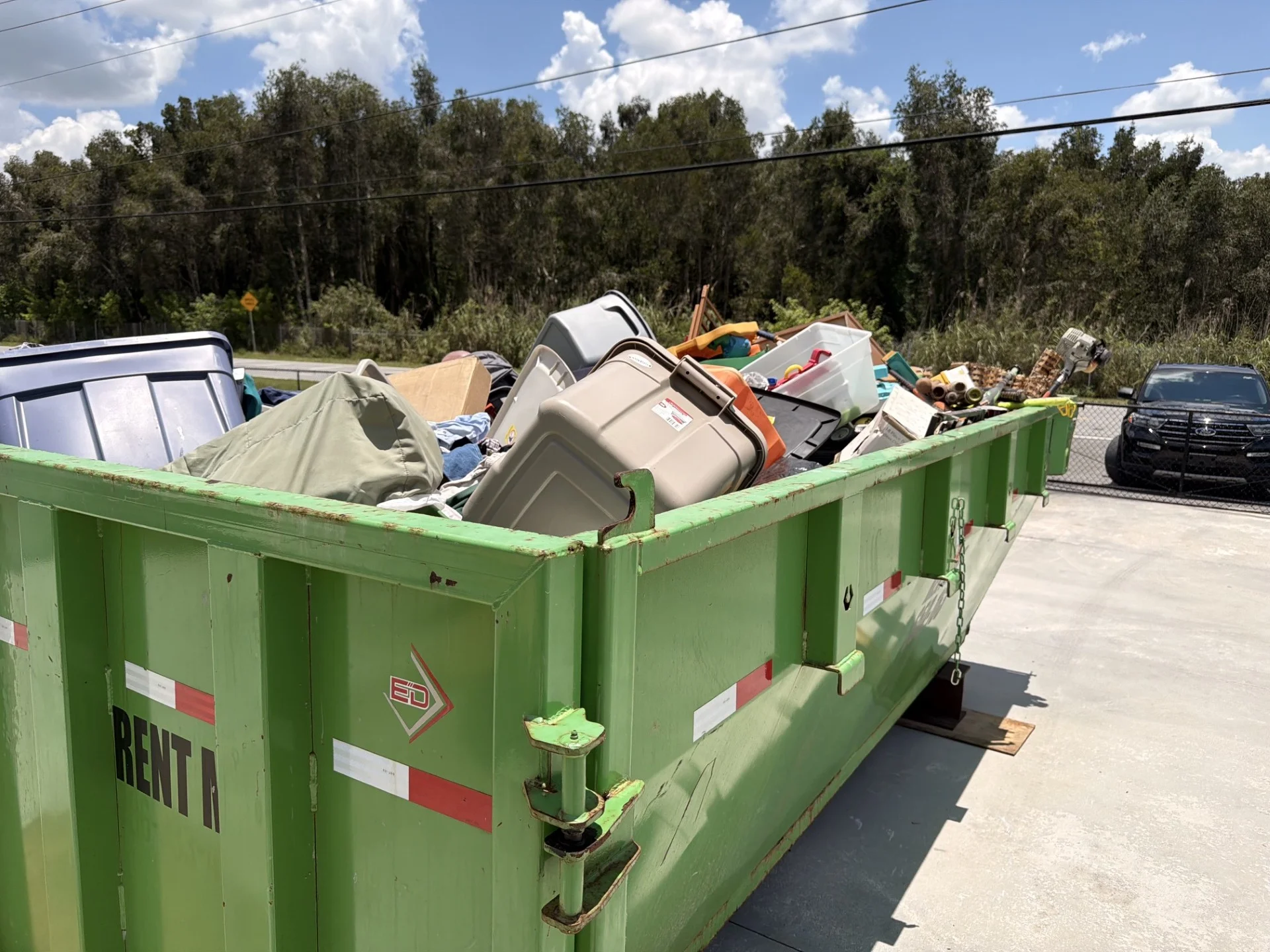 15 yard roll-off dumpster rental Palm City FL — home cleanout